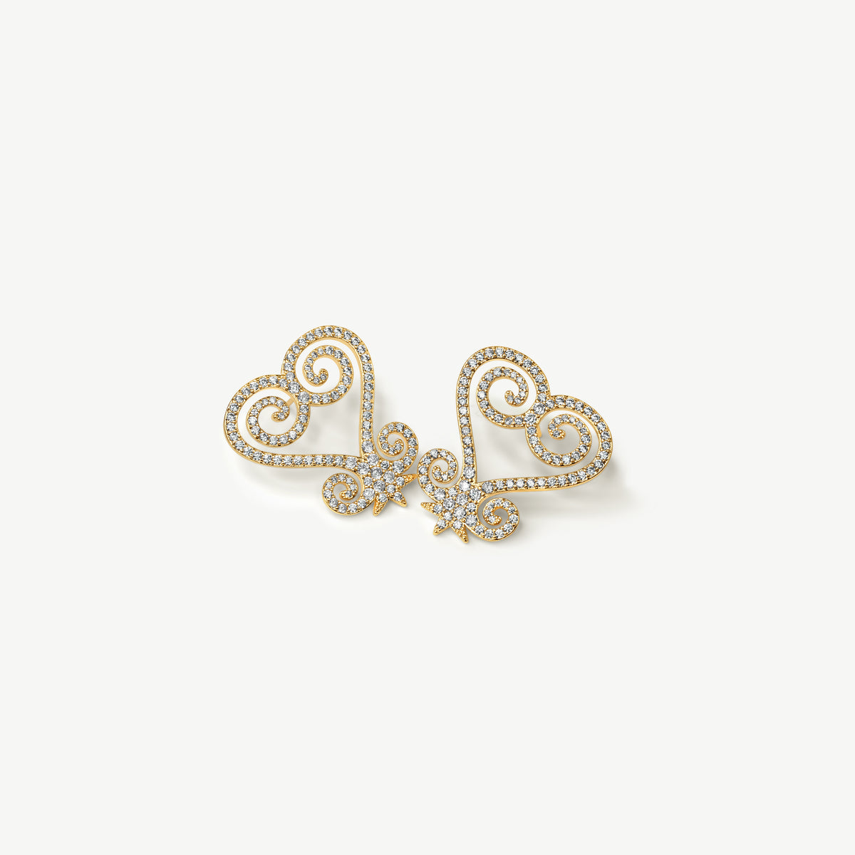 A product shot of CASA London's silver Sankofa Pavé earrings displayed on a clean white background. One earring is shown from the front and the other from the back, highlighting the intricate heart-shaped Sankofa Adinkra symbol meticulously encrusted with shimmering pavé-set stones. This display showcases the brand's unwavering commitment to superior craftsmanship and modern luxury design.